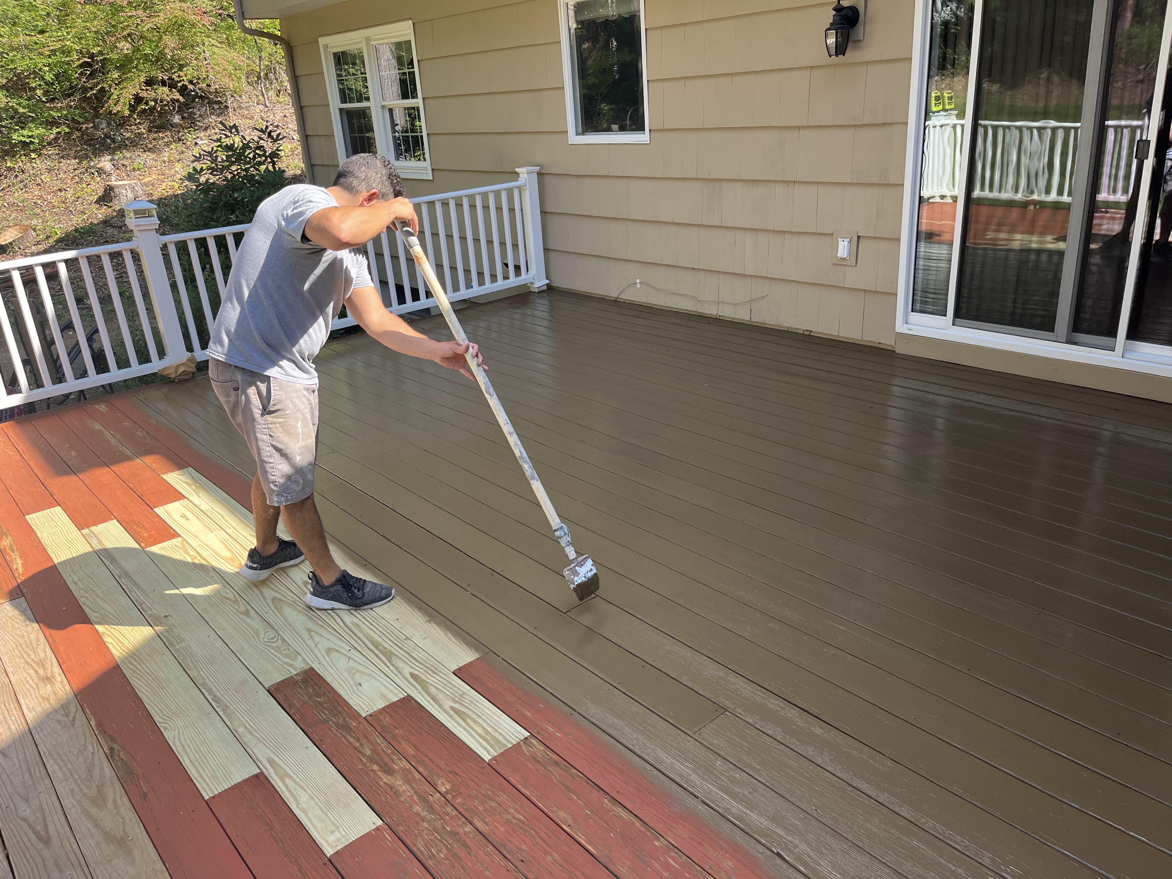 Freshly painted deck and arbor with a rich, protective finish